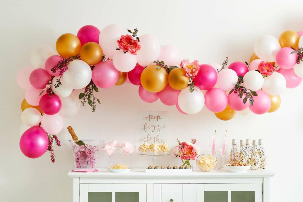 pink , white and golden floral balloon garland